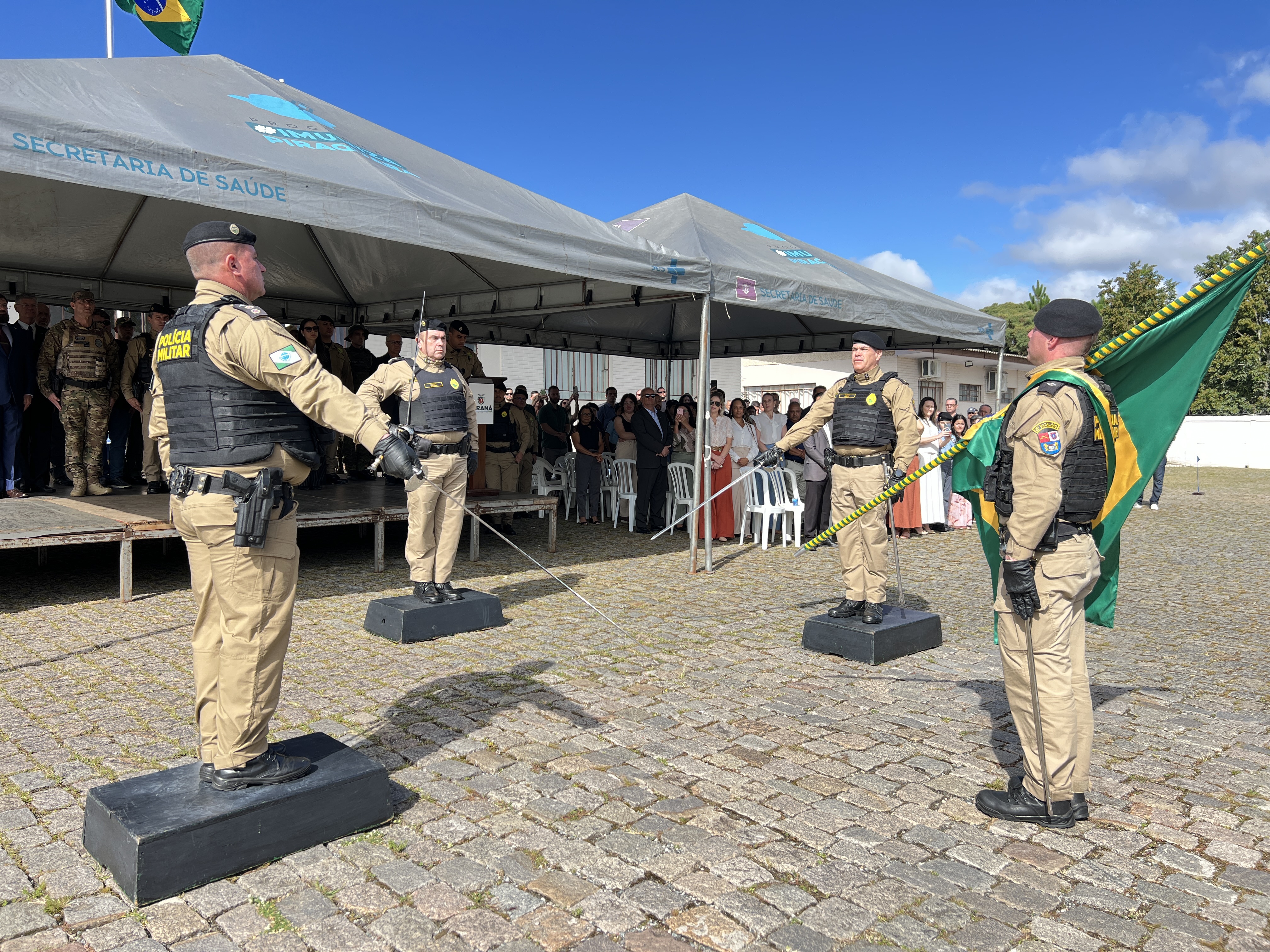  O ato marcou a entrega do comando do tenente-coronel Luiz Alexandre Murbach Soares ao major Paulo Fernando Pires Ribeiro