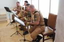 Banda da PM homenageia Comandante-Geral com música e comemora promoção de integrantes em solenidade no Palácio do Iguaçu