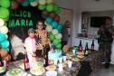 No Litoral, policiais militares realizam sonho de fã mirim em festa de aniversário