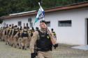  O ato marcou a entrega do comando do tenente-coronel Luiz Alexandre Murbach Soares ao major Paulo Fernando Pires Ribeiro