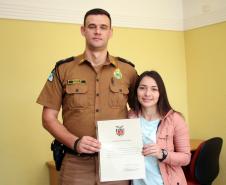 Oficiais da PM recebem a Carta Patente do 1º Posto durante solenidade em Curitiba