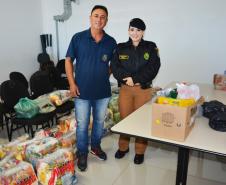 Policiais militares do COPOM de Londrina arrecadam alimentos para famílias carentes