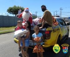 Batalhão da PM de Colombo, na RMC, entrega cerca de mil brinquedos durante ação de Natal