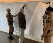 BPTran parabeniza militares estaduais e resgata histórico da unidade com painel de fotografias