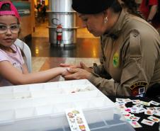 PMPR e Forças de Segurança Intensificam Ações de Proteção à Mulher durante evento da SESP no Shopping Estação