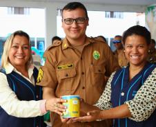 Curitiba, 30 de agosto de 2018. Entrega de latas de leite para APAE